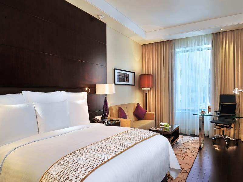 Jaipur Marriott Hotel Kültér fotó A room at the Taj Bengal