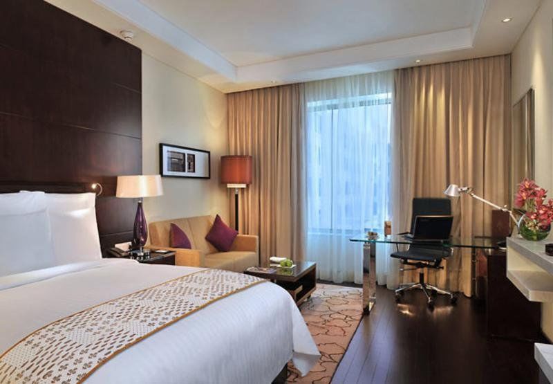 Jaipur Marriott Hotel Kültér fotó A room at the Taj Bengal